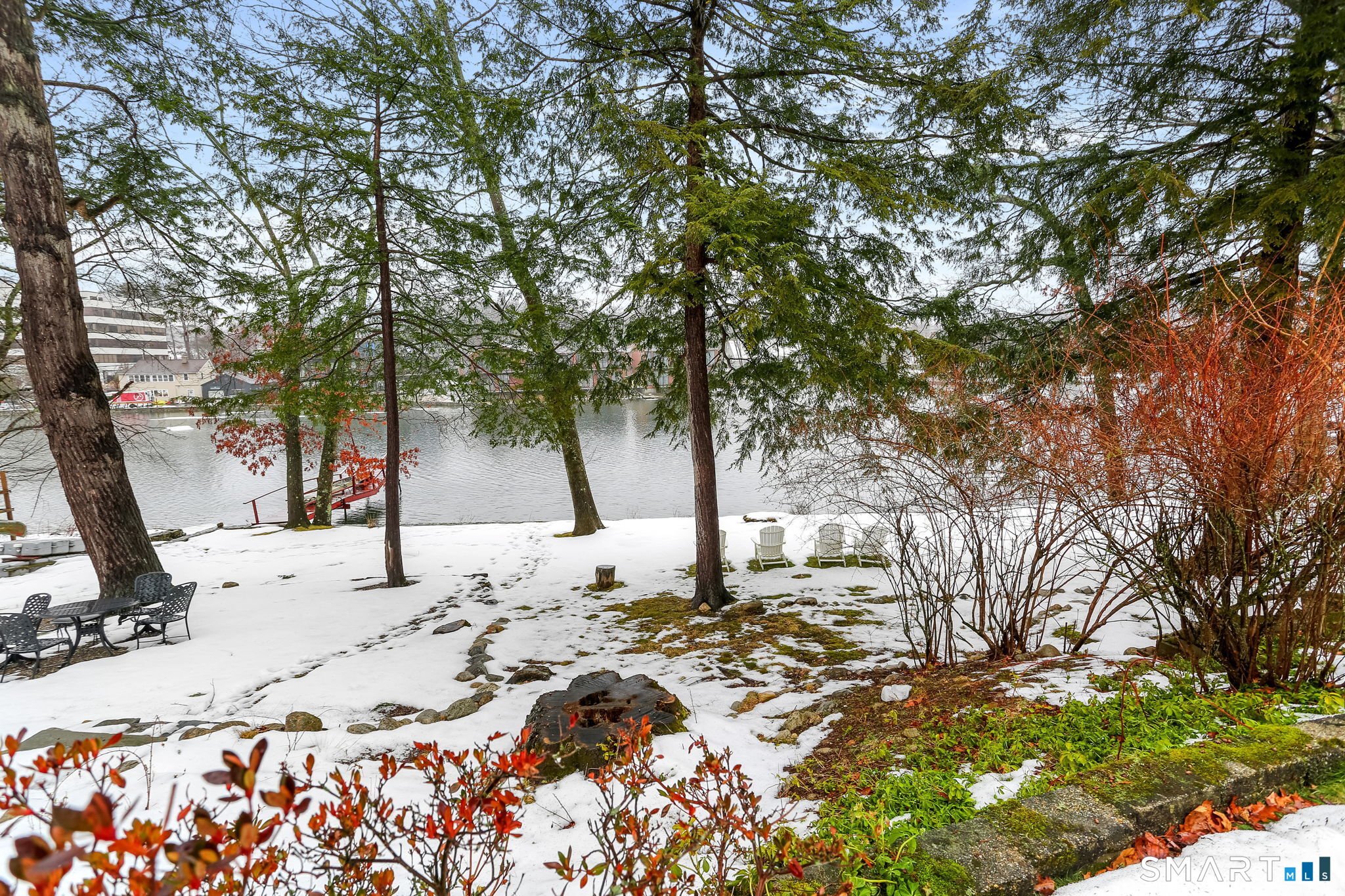 3 Riverview Road Westport, CT 06880 - Photo 25 of 29 a view of a backyard of snow