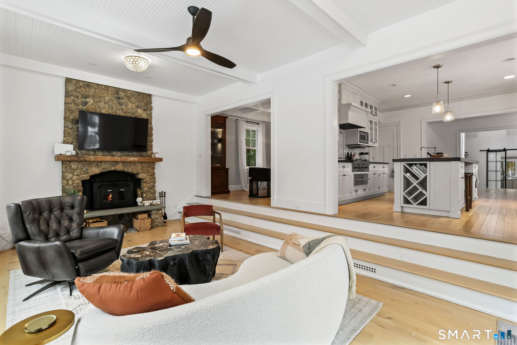 3 Riverview Road Westport, CT 06880 - Photo 10 of 29 a living room with furniture and a fireplace