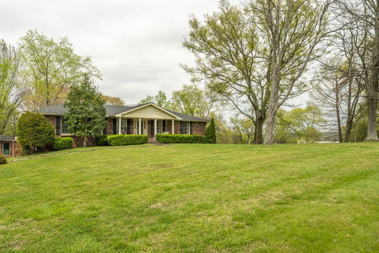 717 Preston Road Antioch, TN 37013 - Photo 14 of 16 a front view of a house with a garden
