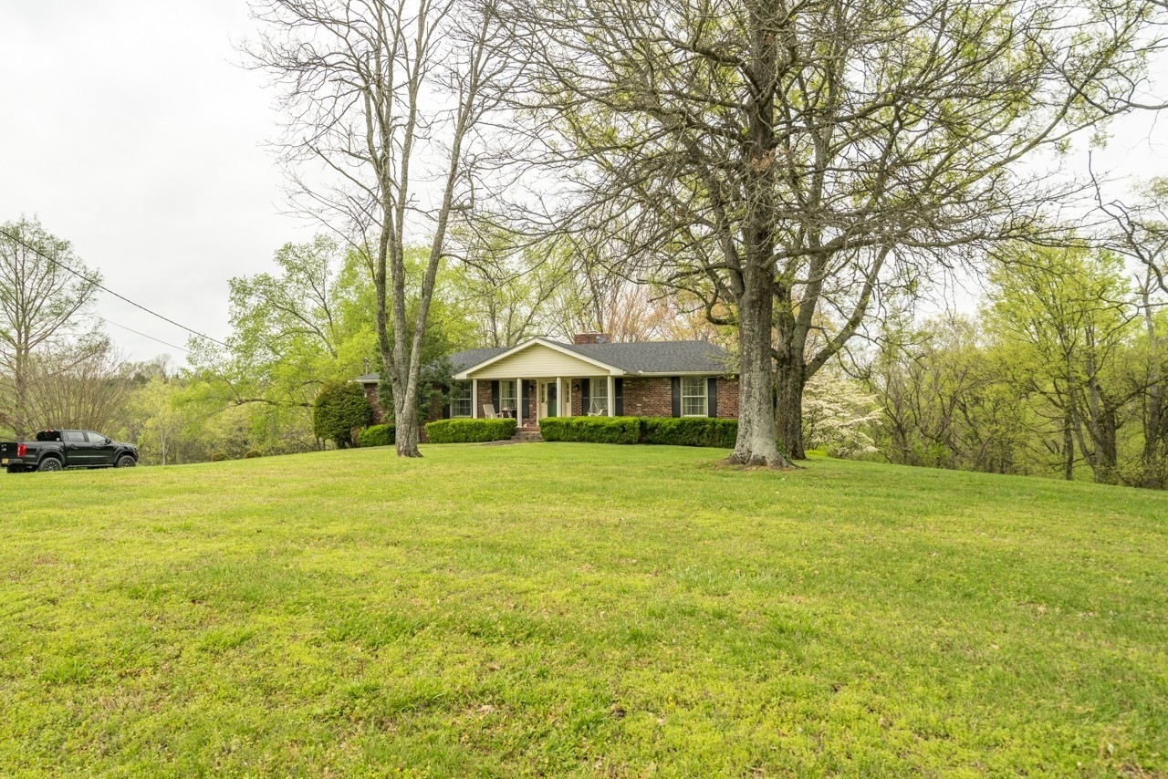 717 Preston Road Antioch, TN 37013 - Photo 15 of 16 a front view of a house with a garden