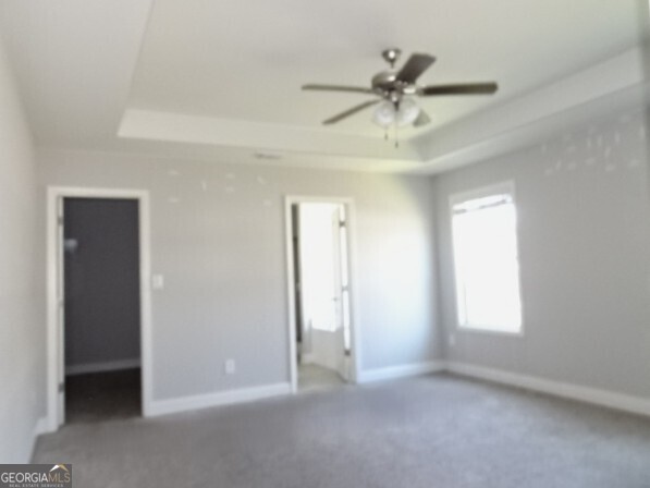133 Worchester Circle Perry, GA 31069 - Photo 11 of 16 a view of an empty room with a window