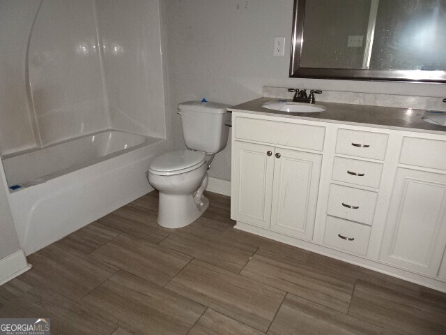 133 Worchester Circle Perry, GA 31069 - Photo 15 of 16 a bathroom with a granite countertop sink toilet and shower