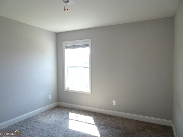 133 Worchester Circle Perry, GA 31069 - Photo 16 of 16 an empty room with a window