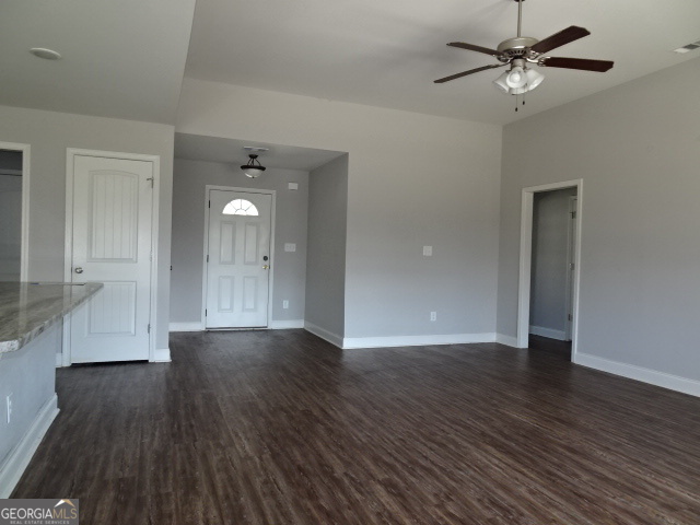 133 Worchester Circle Perry, GA 31069 - Photo 7 of 16 a view of an empty room with wooden floor