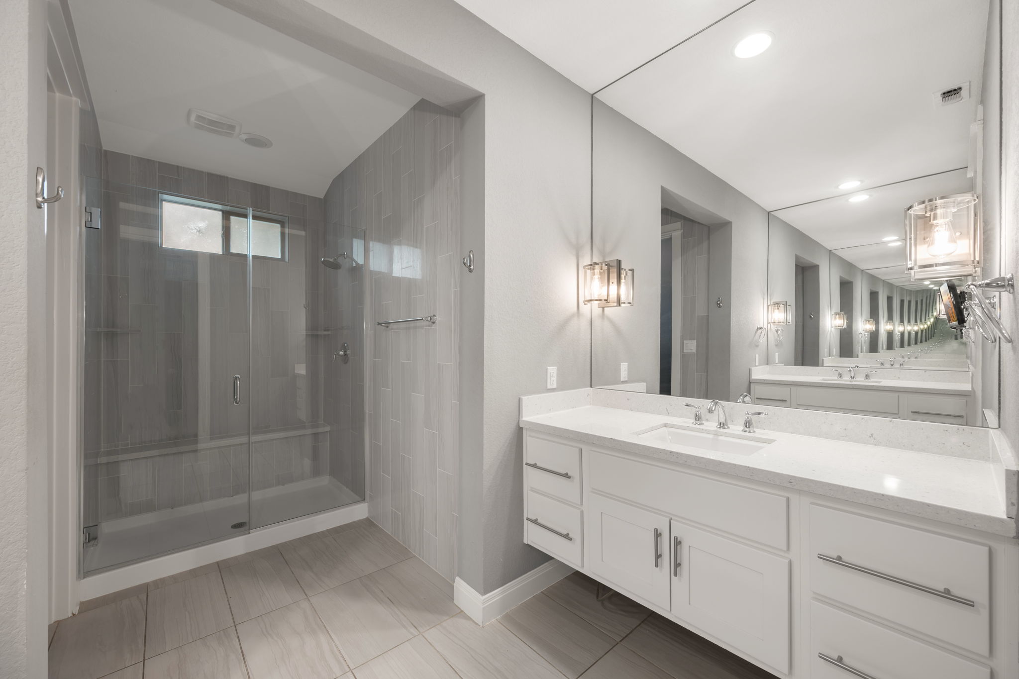 13708 Golden Wave Loop Austin, TX 78738 - Photo 22 of 34 Bathroom featuring a large vanity with white cabinetry, a white countertop, and a built-in sink