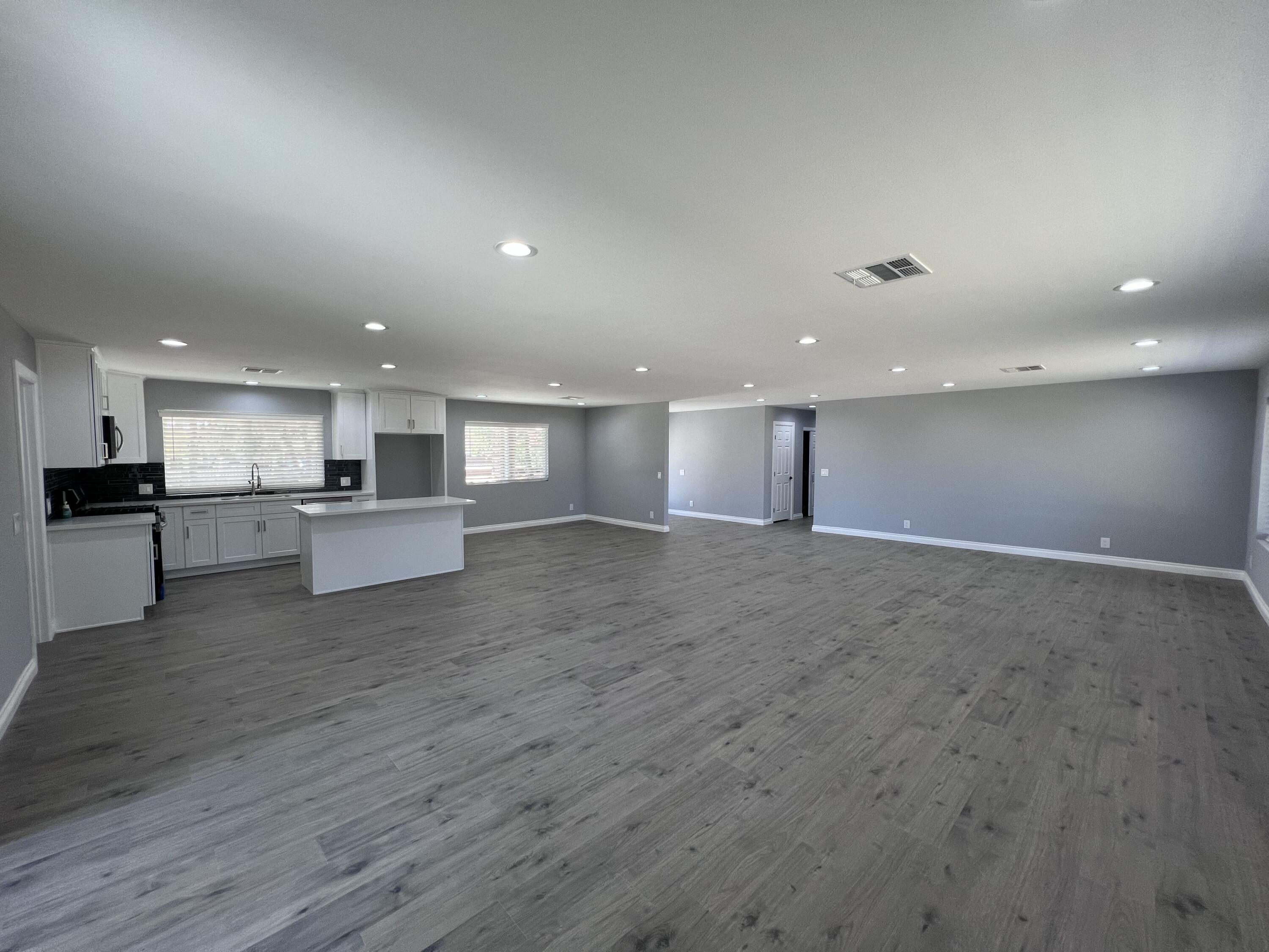 3255 East E Avenue Lancaster, CA 93535 - Photo 20 of 81 a view of kitchen with kitchen island and stainless steel appliances