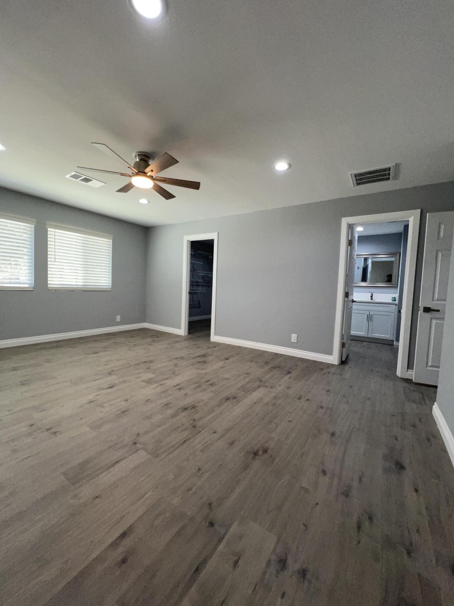 3255 East E Avenue Lancaster, CA 93535 - Photo 56 of 81 a view of an empty room with a fireplace