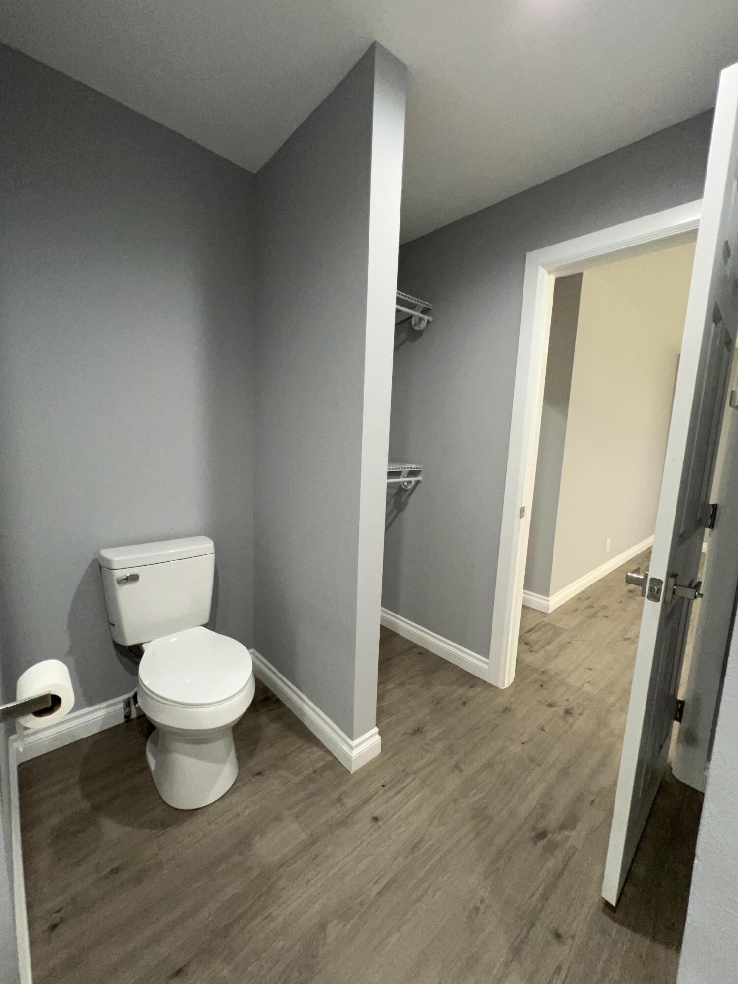 3255 East E Avenue Lancaster, CA 93535 - Photo 58 of 81 a bathroom with a toilet and a sink