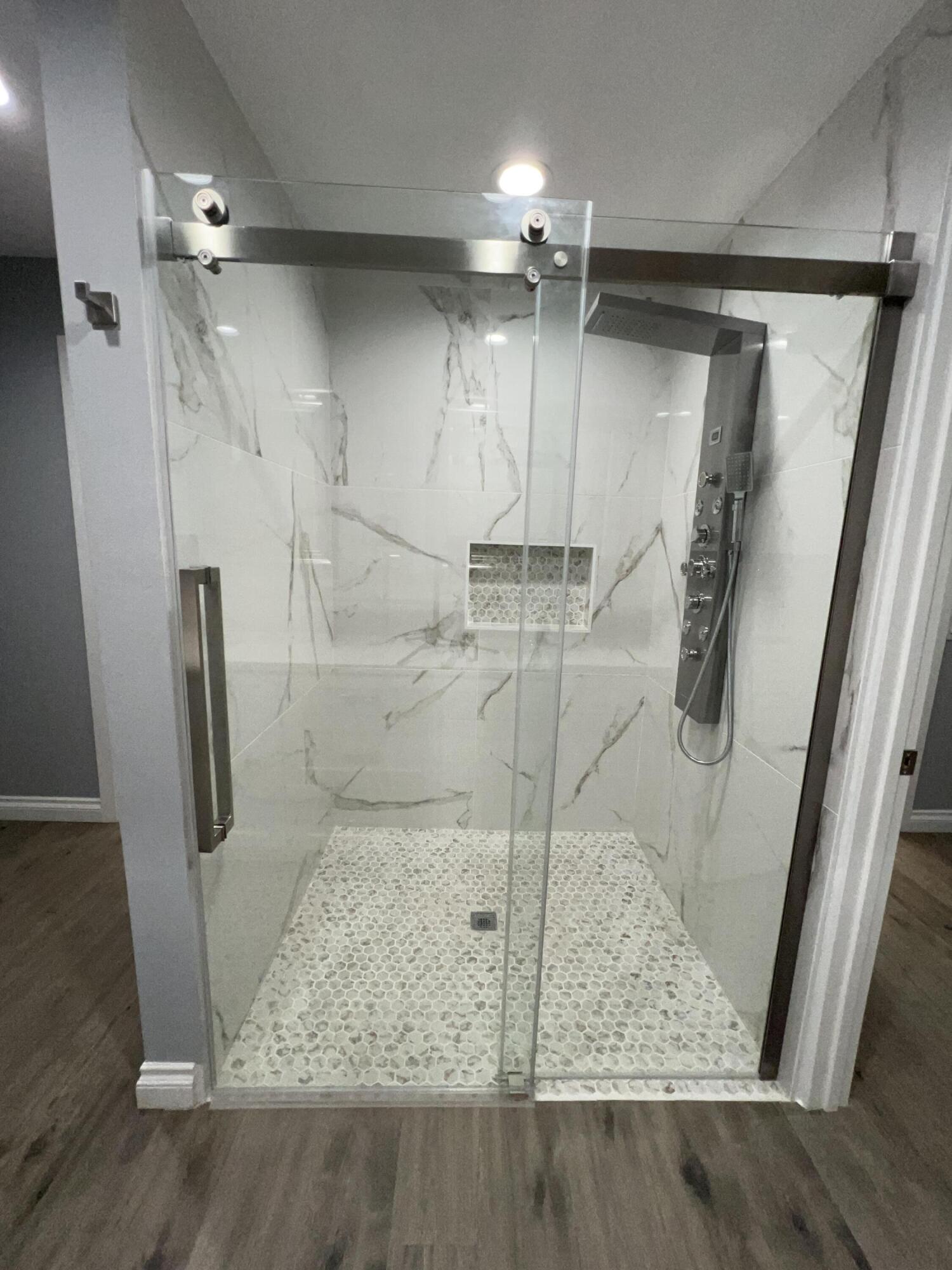 3255 East E Avenue Lancaster, CA 93535 - Photo 62 of 81 a bathroom with a shower