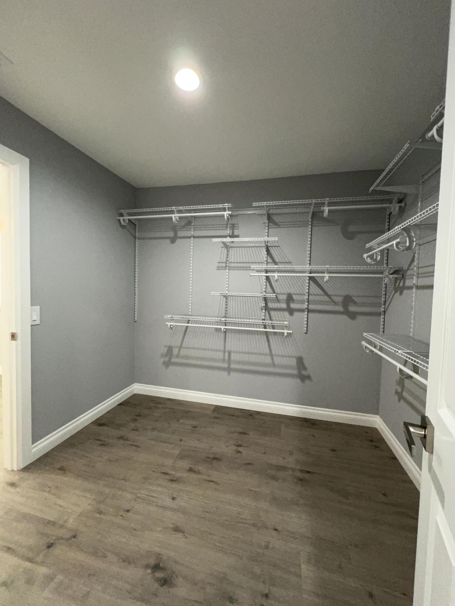 3255 East E Avenue Lancaster, CA 93535 - Photo 65 of 81 a view of a room with racks on the wall