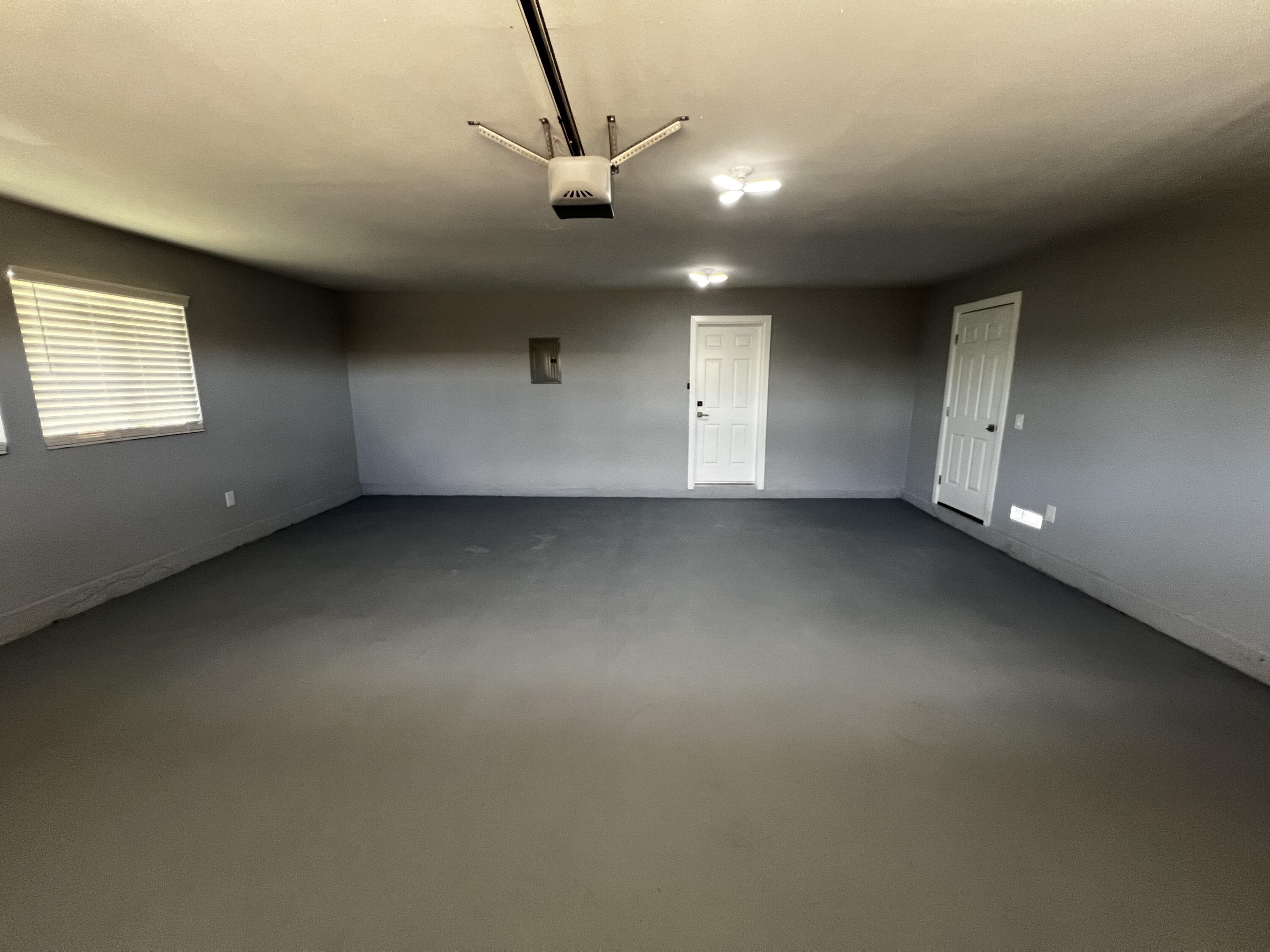 3255 East E Avenue Lancaster, CA 93535 - Photo 71 of 81 an empty room with a ceiling fan and window