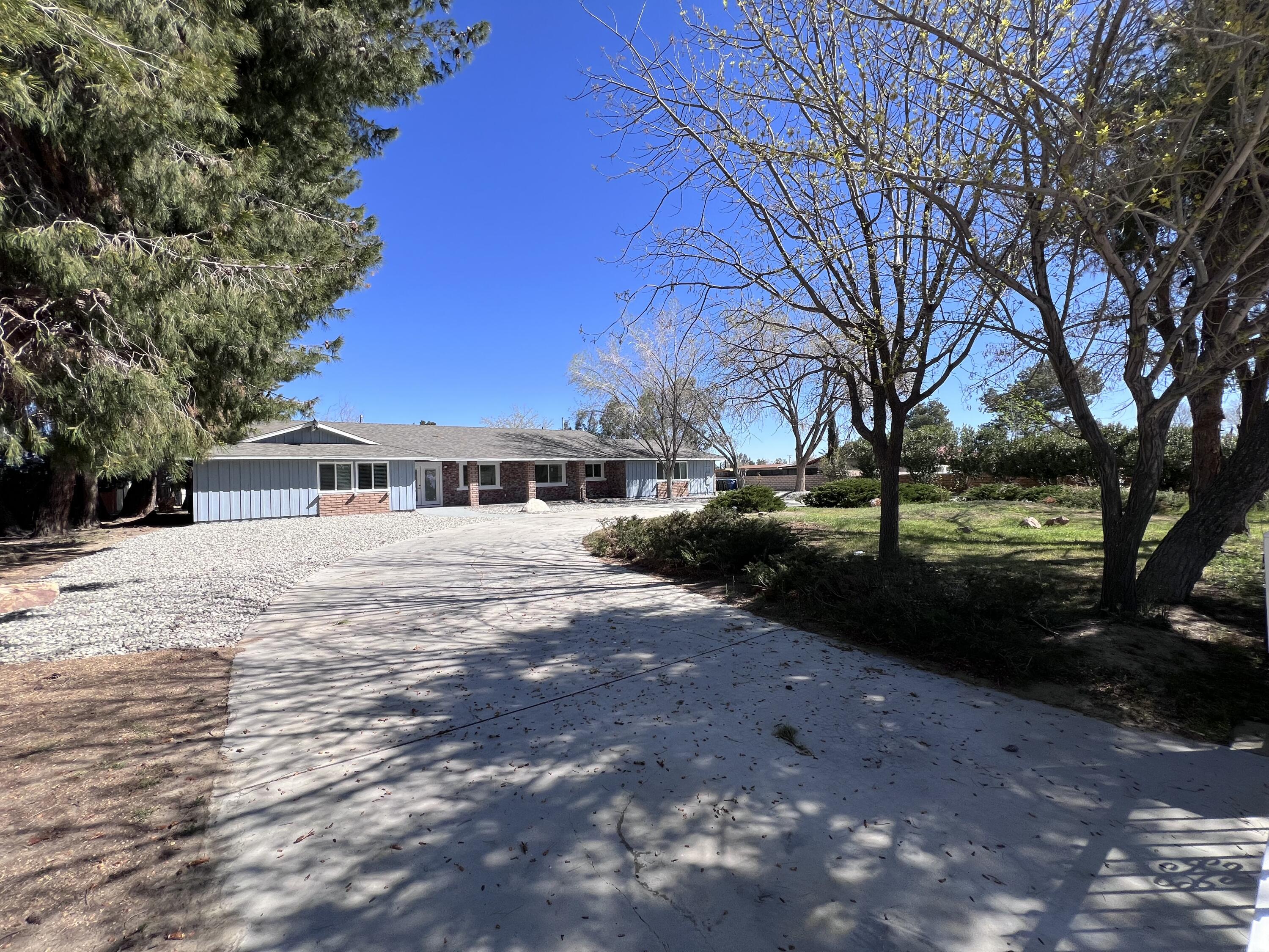 3255 East E Avenue Lancaster, CA 93535 - Photo 10 of 81 a view of house with outdoor space