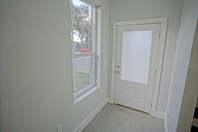 a view of entryway with stairs