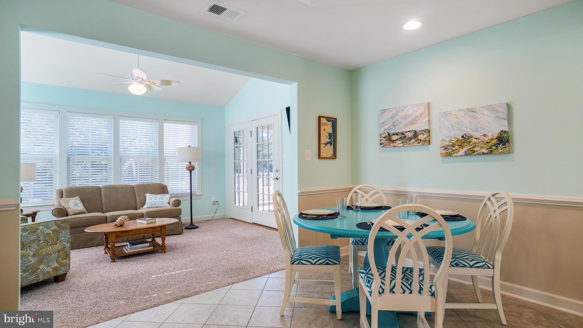 30933 Starling Road, Unit 105A Ocean View, DE 19970 - Photo 9 of 52 Sunroom off the kitchen brings light throughout.