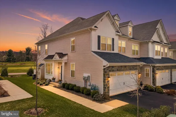 a view of house with yard