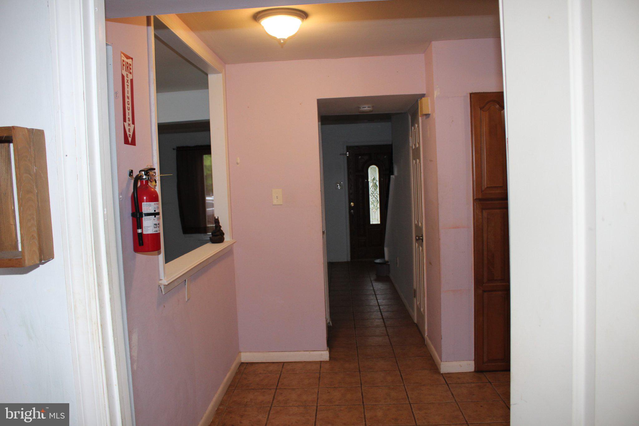 146 Oakmont Road Clementon, NJ 08021 - Photo 14 of 29 Welcoming hallway with soft hues.