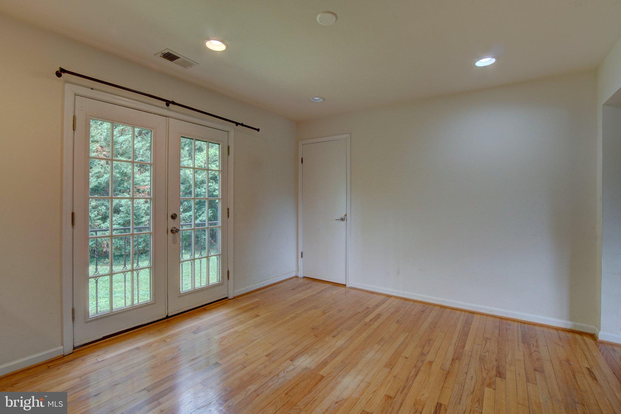 900 Walker Road Great Falls, VA 22066 - Photo 10 of 52 Bright and airy space with garden view.
