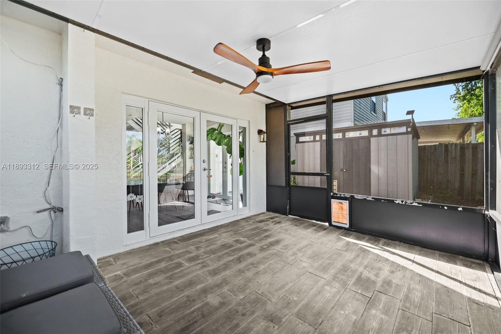 139 Southwest 159th Way Sunrise, FL 33326 - Photo 30 of 40 a view of a hallway with wooden floor and windows