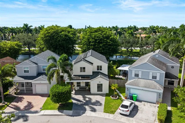 an aerial view of a house with garden
