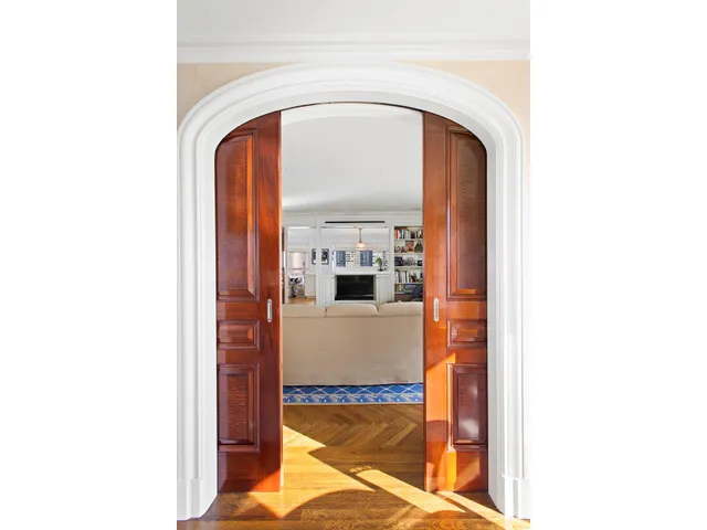 a spacious bathroom with a sink a mirror and a shower