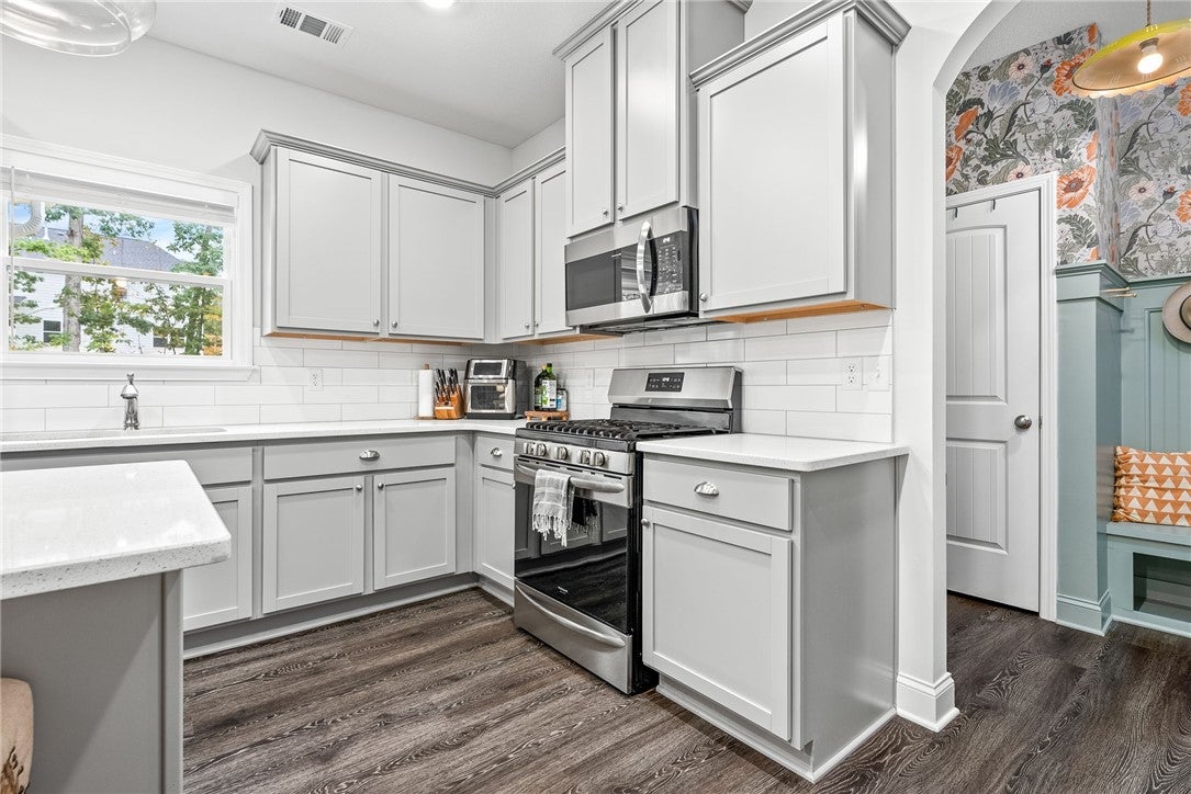 1883 Waterfall Road Auburn, AL 36830 - Photo 12 of 37 The home comes with refrigerator, built in microwave, stove and dishwasher