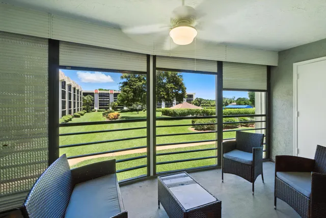 a room with furniture and a window
