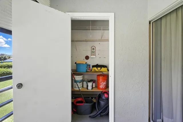 a room with storage and utility