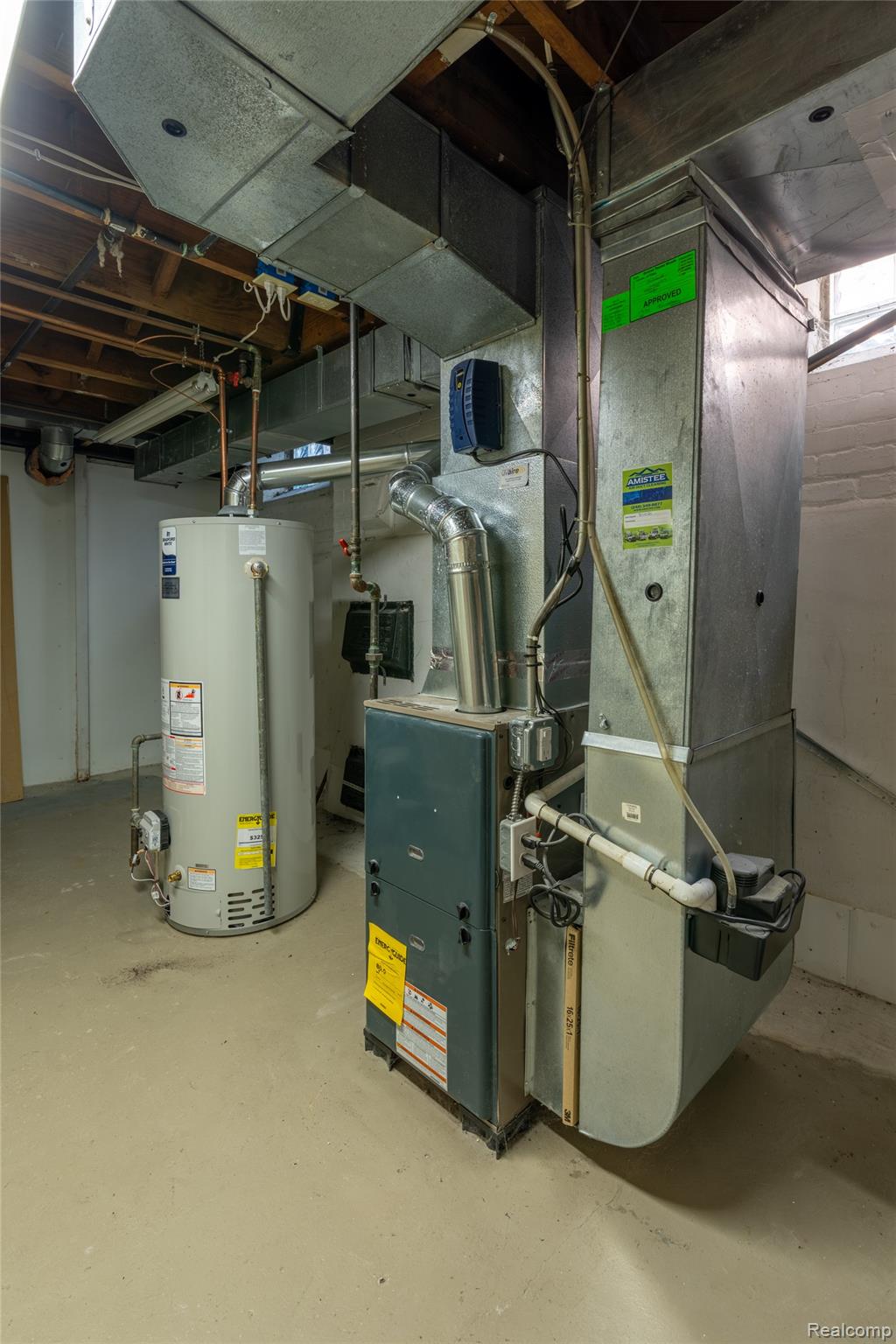 1481 Oxford Road Grosse Pointe, MI 48236 - Photo 18 of 29 Mechanical room with visible water heater, furnace, and extensive ductwork