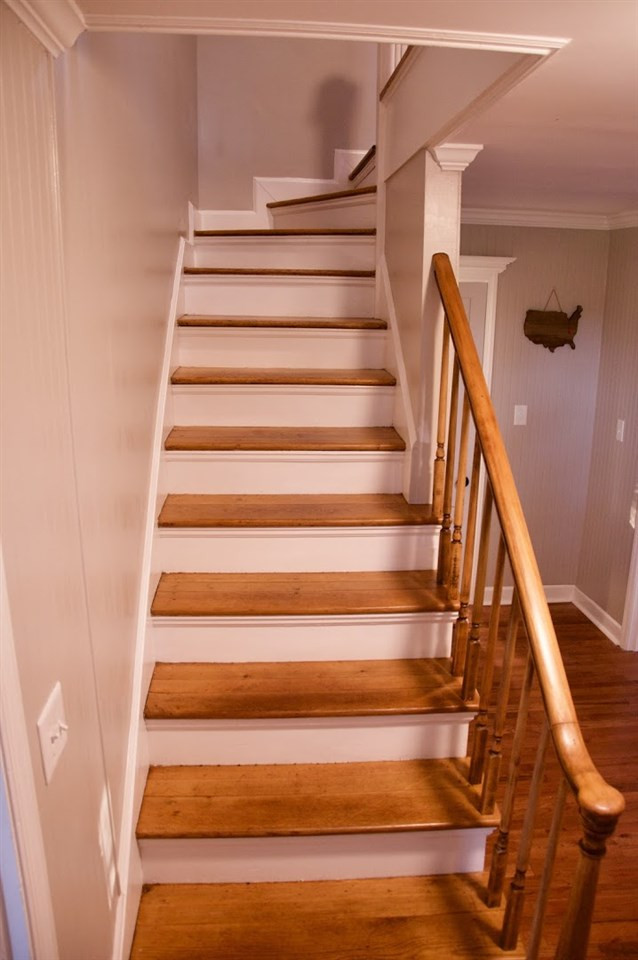 2120 Mary Hobby Road Raleigh, NC 27603 - Photo 15 of 30 Staircase and hardwoods are original to 1948 Staircase
