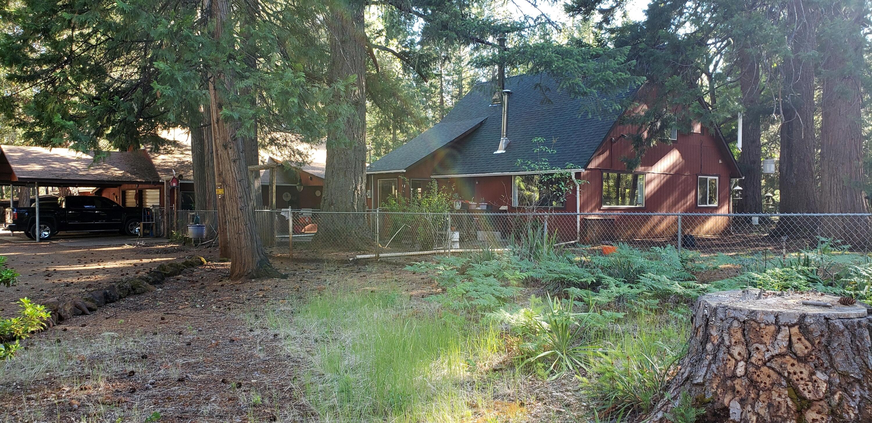 1200 Rough And Ready Creek Road Cave Junction, OR 97523 - Photo 30 of 40 front view of home- garage. all fened ar