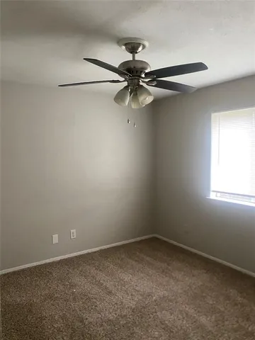 a view of a window in an empty room