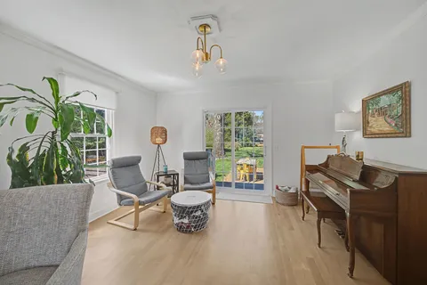 a living room with furniture and a window