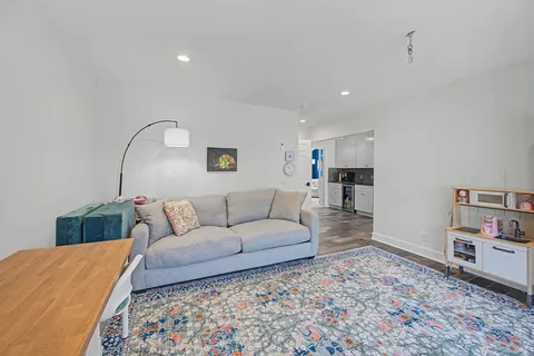 a living room with furniture and a couch