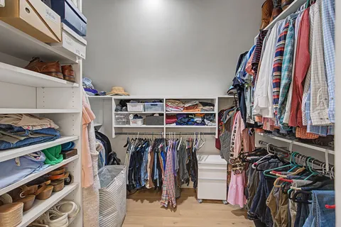 a view of a porch with furniture and garden