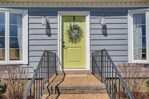 a view of a house with a large window