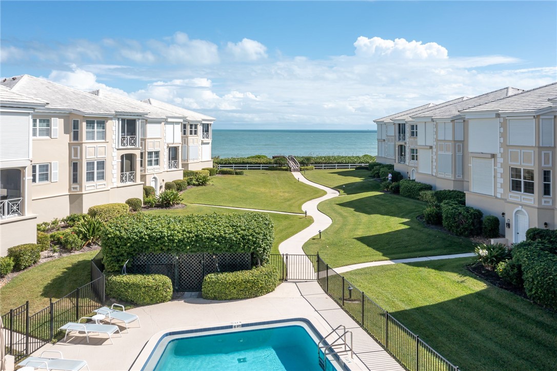 1150 Reef Road, Unit B18 Vero Beach, FL 32963 - Photo 8 of 16 a view of a swimming pool with a patio
