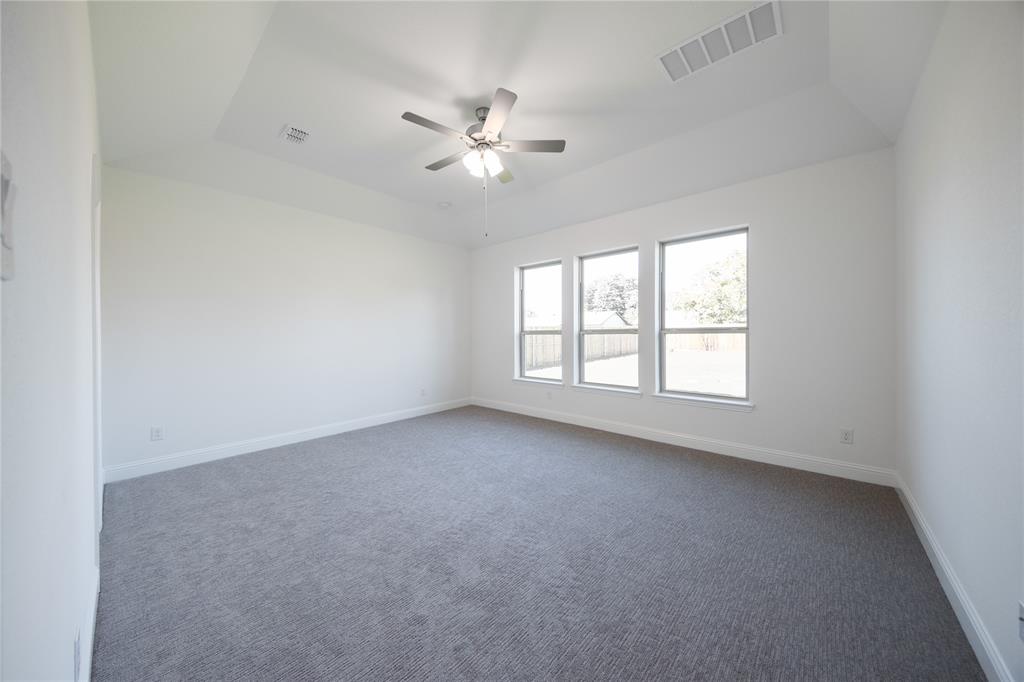 307 Symphony Avenue Forney, TX 75126 - Photo 10 of 24 Primary Bedroom