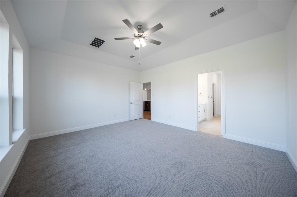 307 Symphony Avenue Forney, TX 75126 - Photo 11 of 24 Primary Bedroom