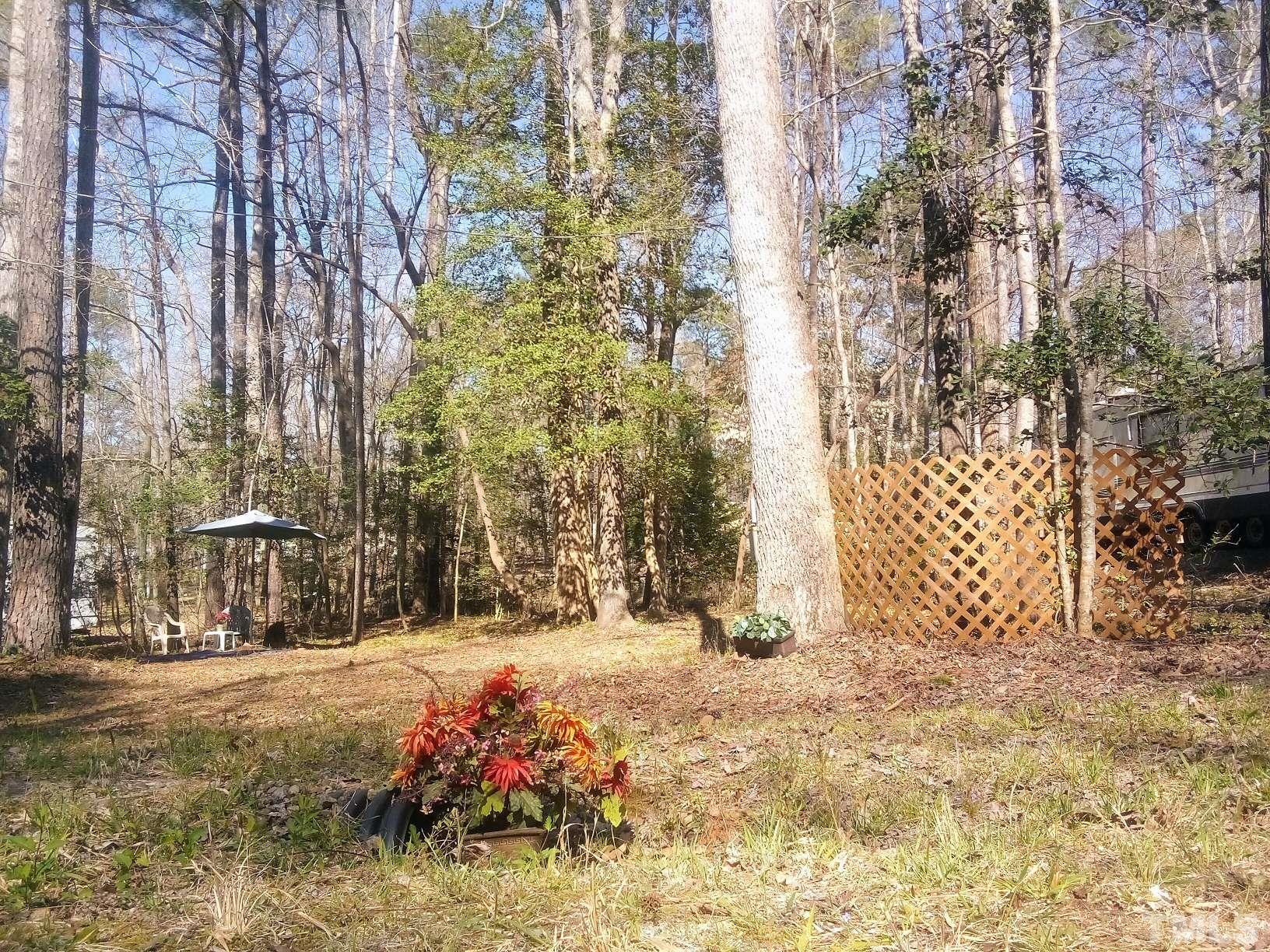 a view of yard covered with snow