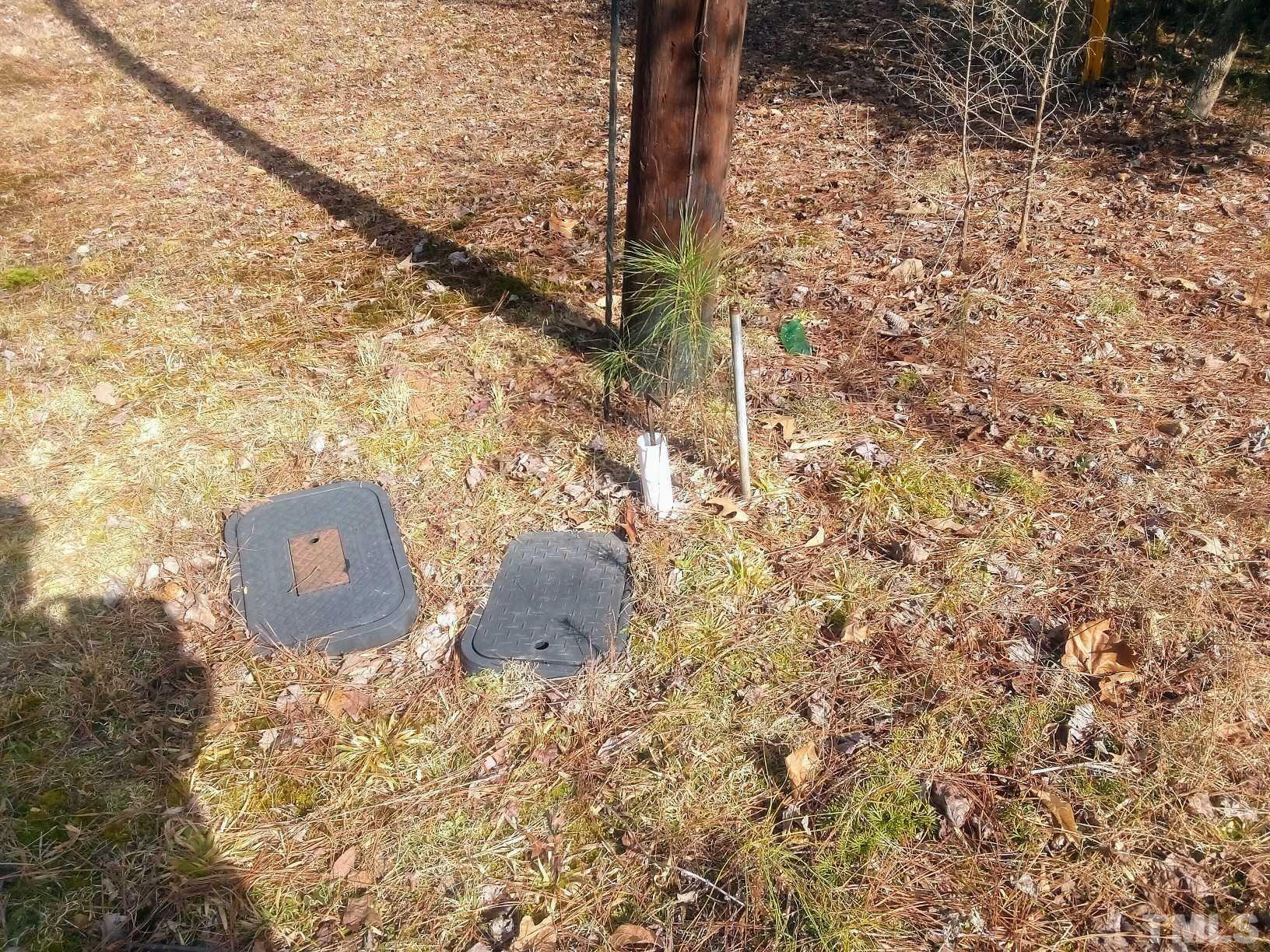 117 Turon Drive Spring Hope, NC 27882 - Photo 13 of 39 a view of a tree in front of a yard