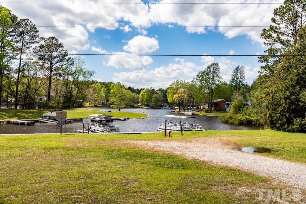 117 Turon Drive Spring Hope, NC 27882 - Photo 23 of 39 a view of swimming pool with table and chairs