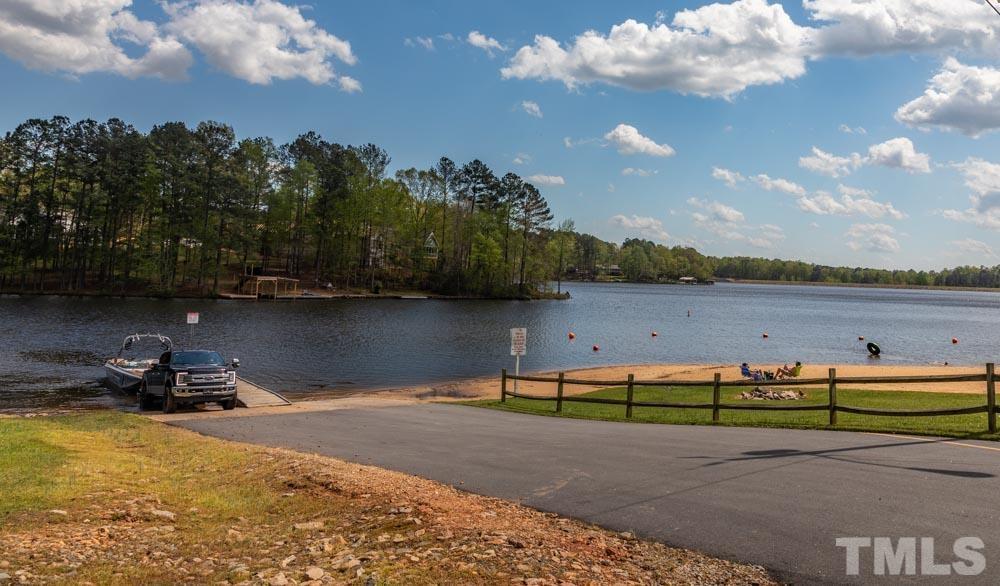 117 Turon Drive Spring Hope, NC 27882 - Photo 26 of 39 a view of a lake with houses
