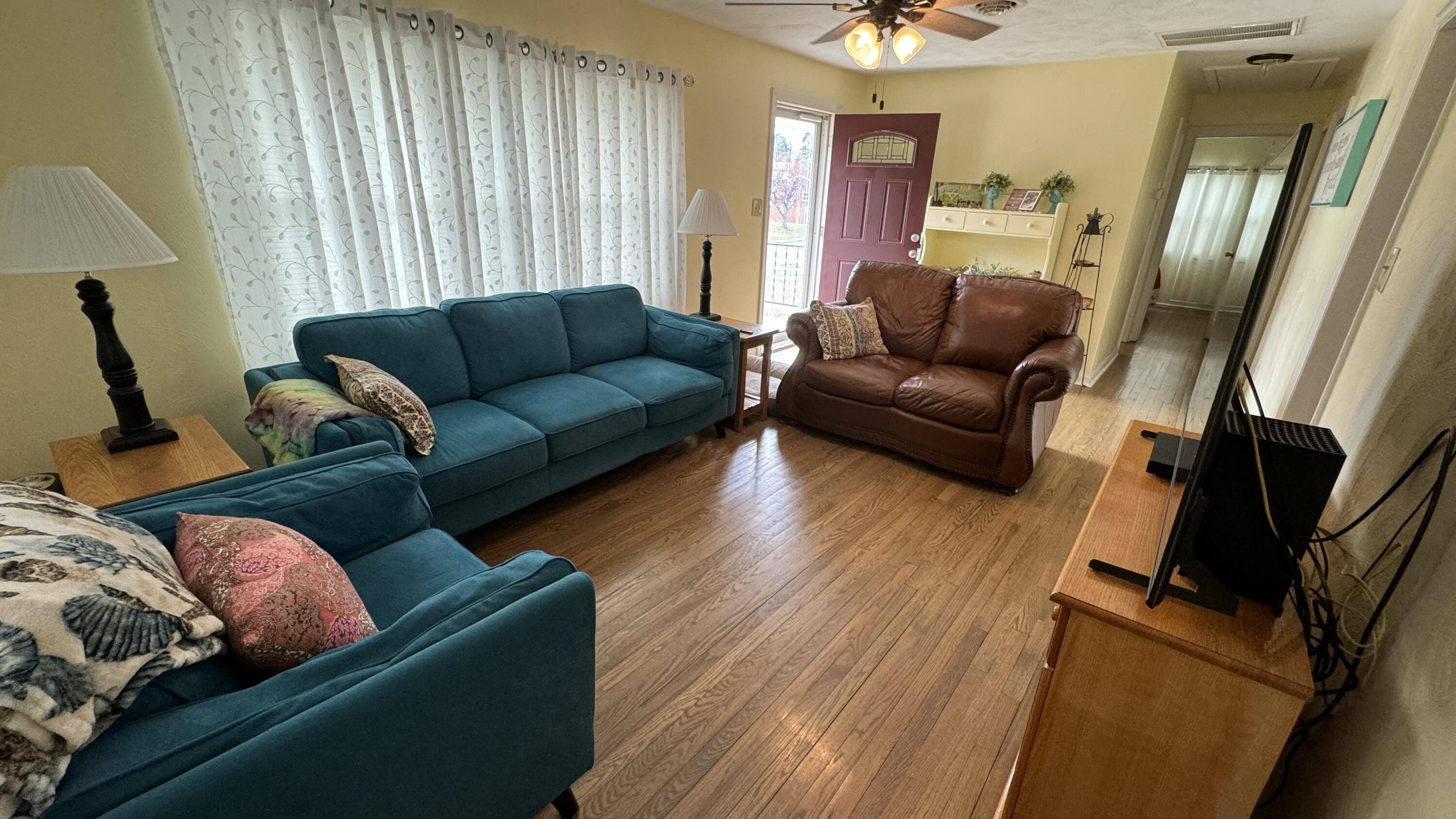 1902 Burma Road Salem, VA 24153 - Photo 7 of 17 a living room with furniture and a flat screen tv