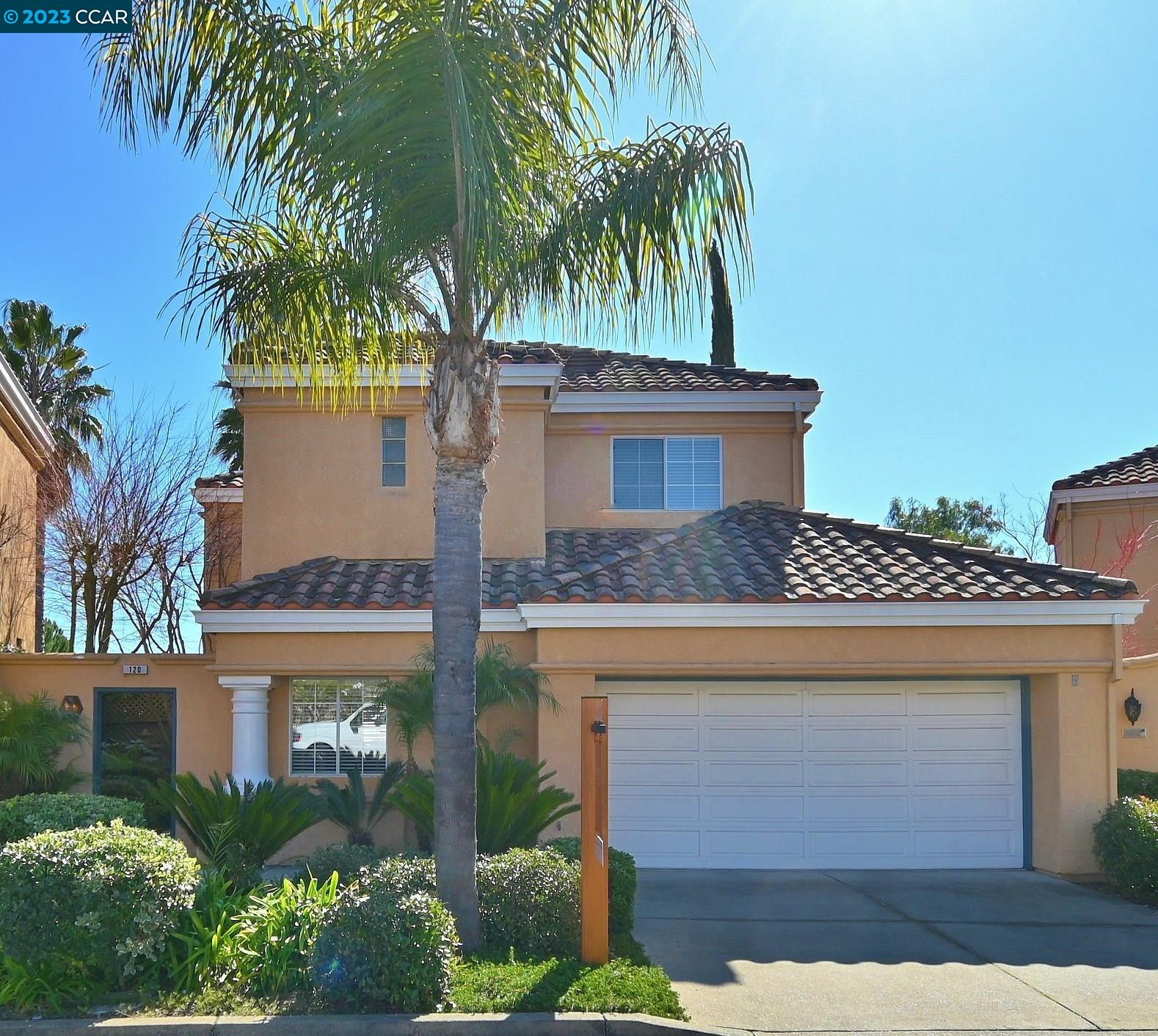 120 Cortona Drive San Ramon, CA 94582 - Photo 1 of 1 a front view of a house with a palm tree
