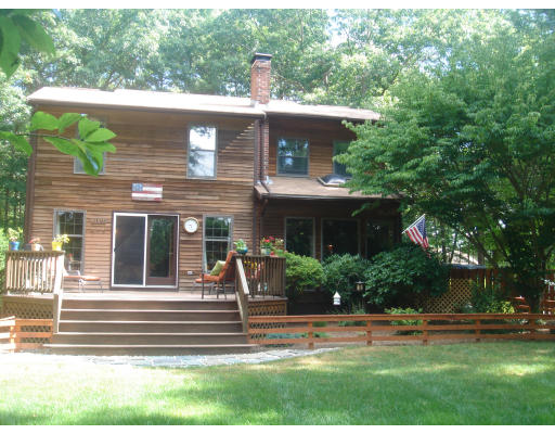108 Highland Road Lakeville, MA 02347 - Photo 1 of 1 a view of a house with a yard