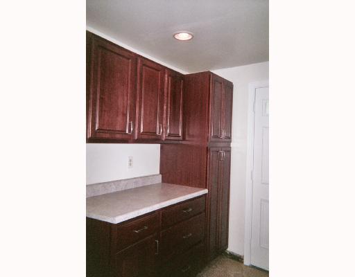 642 Perrymont Road Pittsburgh, PA 15237 - Photo 3 of 8 Kitchen. Just installed Cherry Kitchen Cabinets; Large Pantry, newer Electric Range, Dishwasher, Refrigerator and Disposal
