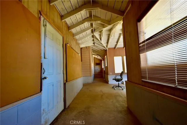 a view of a porch with furniture