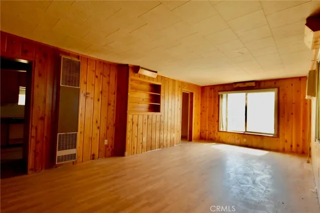 a view of a room with a large window