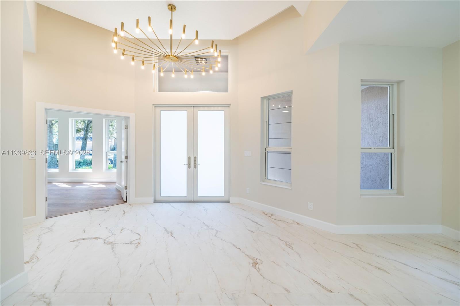 8041 Bermuda Point Lane Davie, FL 33328 - Photo 15 of 60 a view of an empty room with a window
