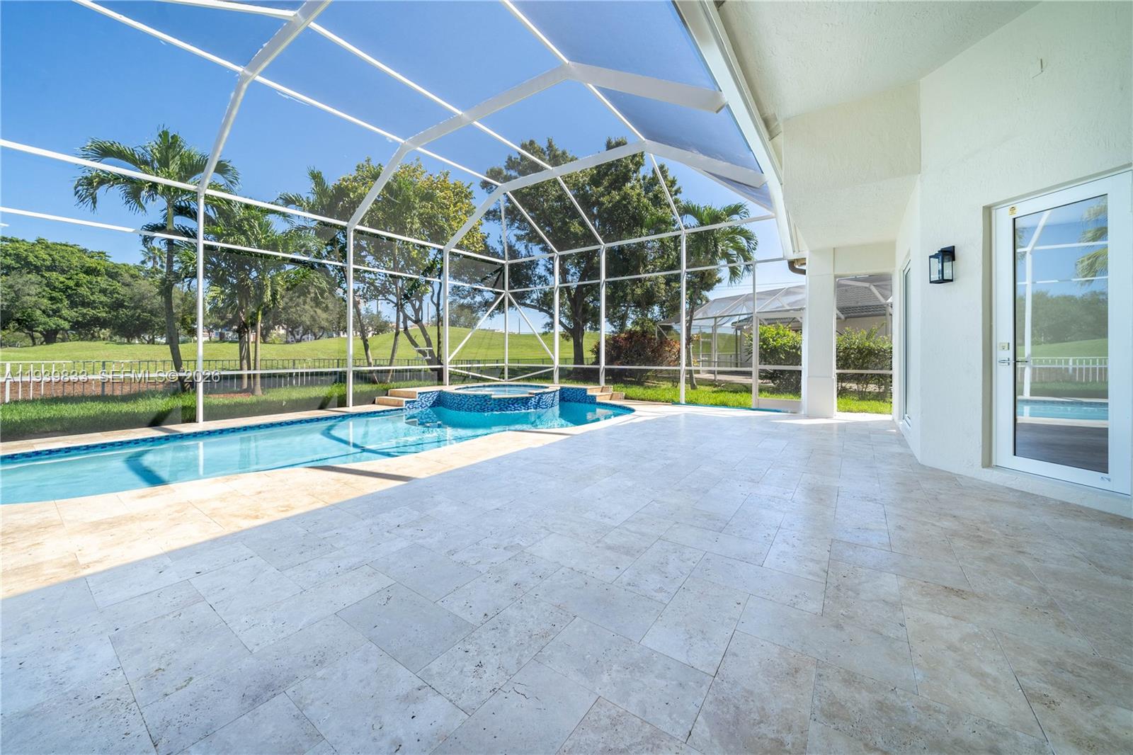 8041 Bermuda Point Lane Davie, FL 33328 - Photo 49 of 60 a view of a backyard